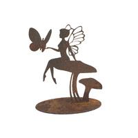 Fairy Sitting On Mushroom Stand 